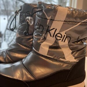 Calvin Klein Metallic Silver and Black Snow Boots